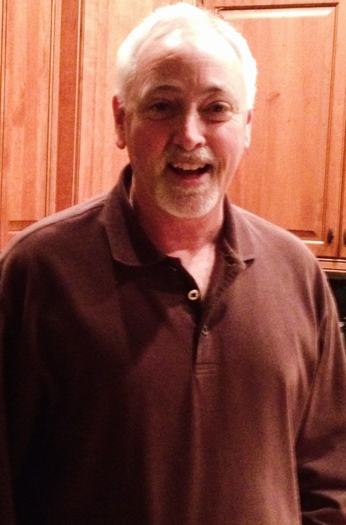 Brian smiling in the kitchen